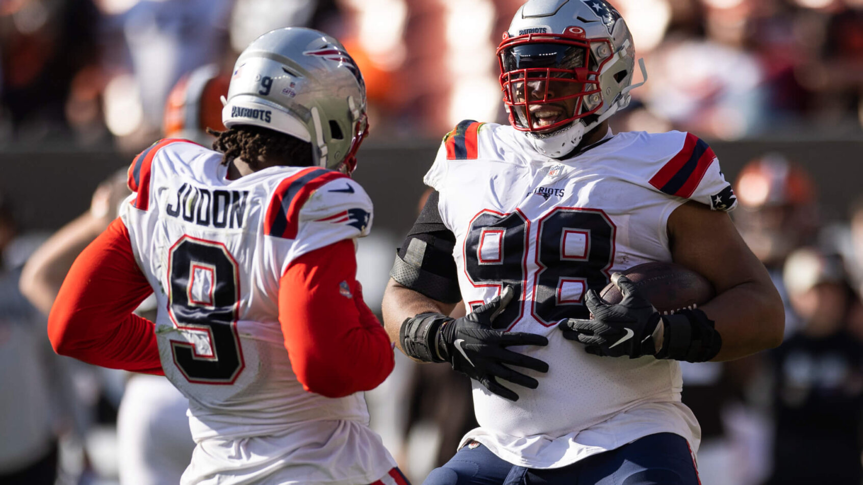 Matthew Judon, Carl Davis celebrate; New England Patriots