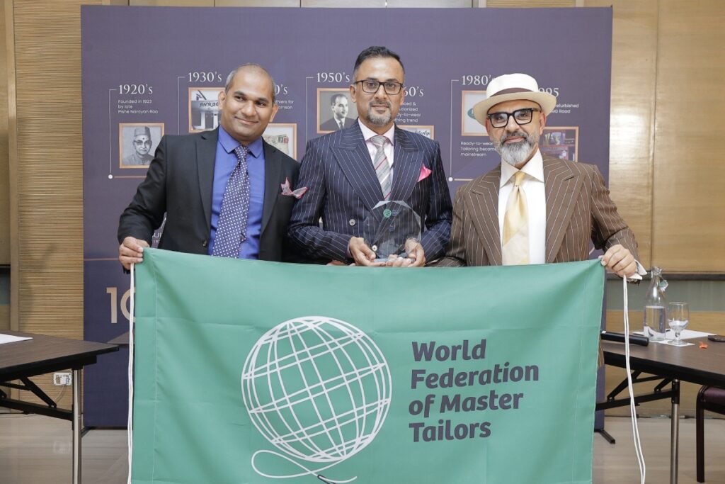 World federation of master tailors awarding Naveen Pishe & Ketan Pishe of PN Rao